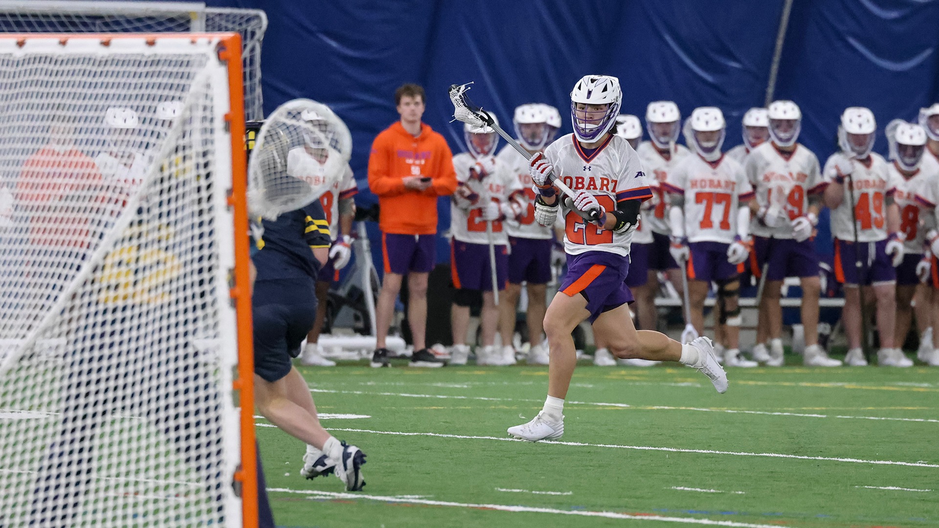 David Peterkin assess the defense as he cradles the ball toward the Michigan goal.