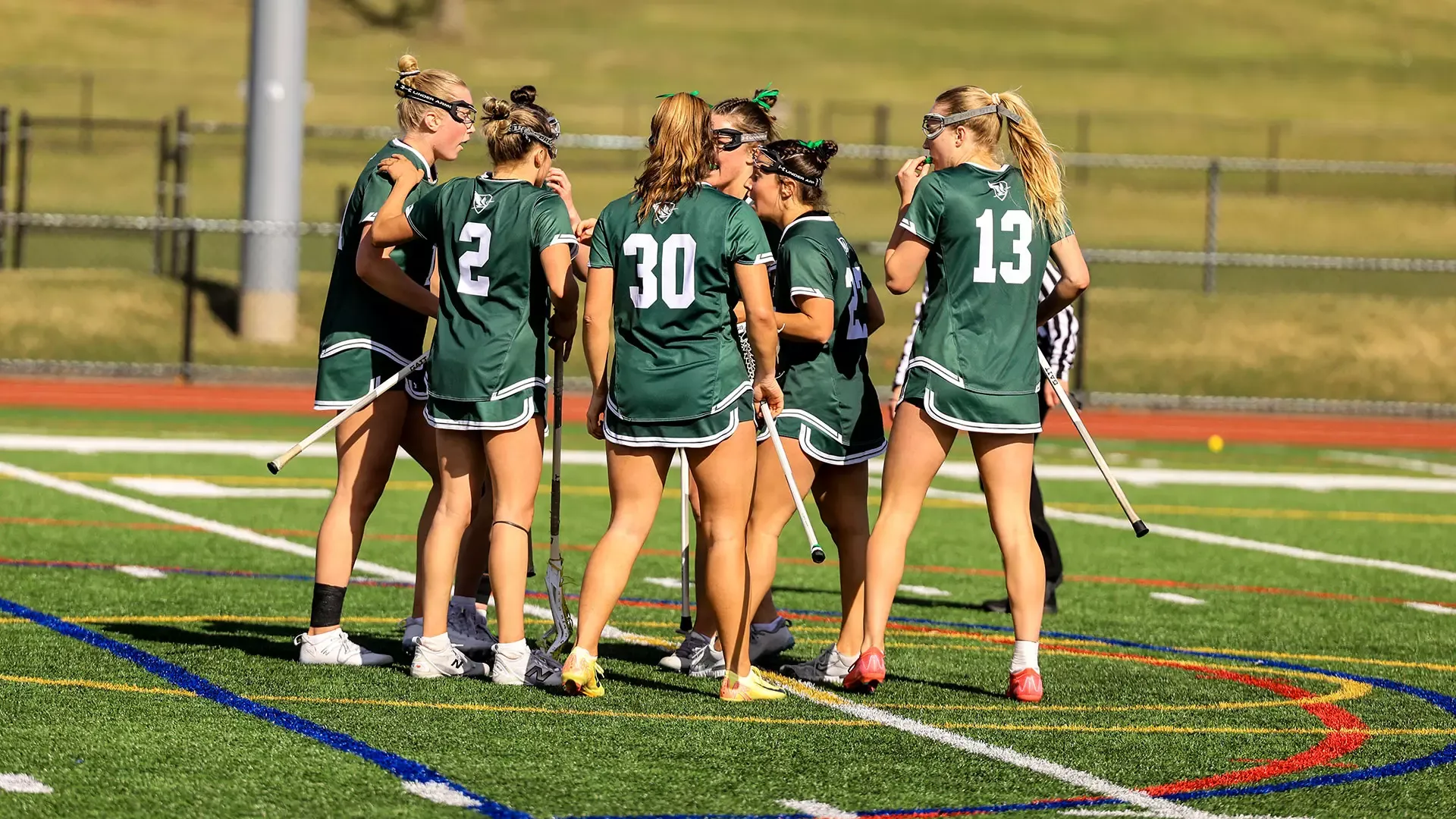 The Herons celebrate a goal against St. Lawrence
