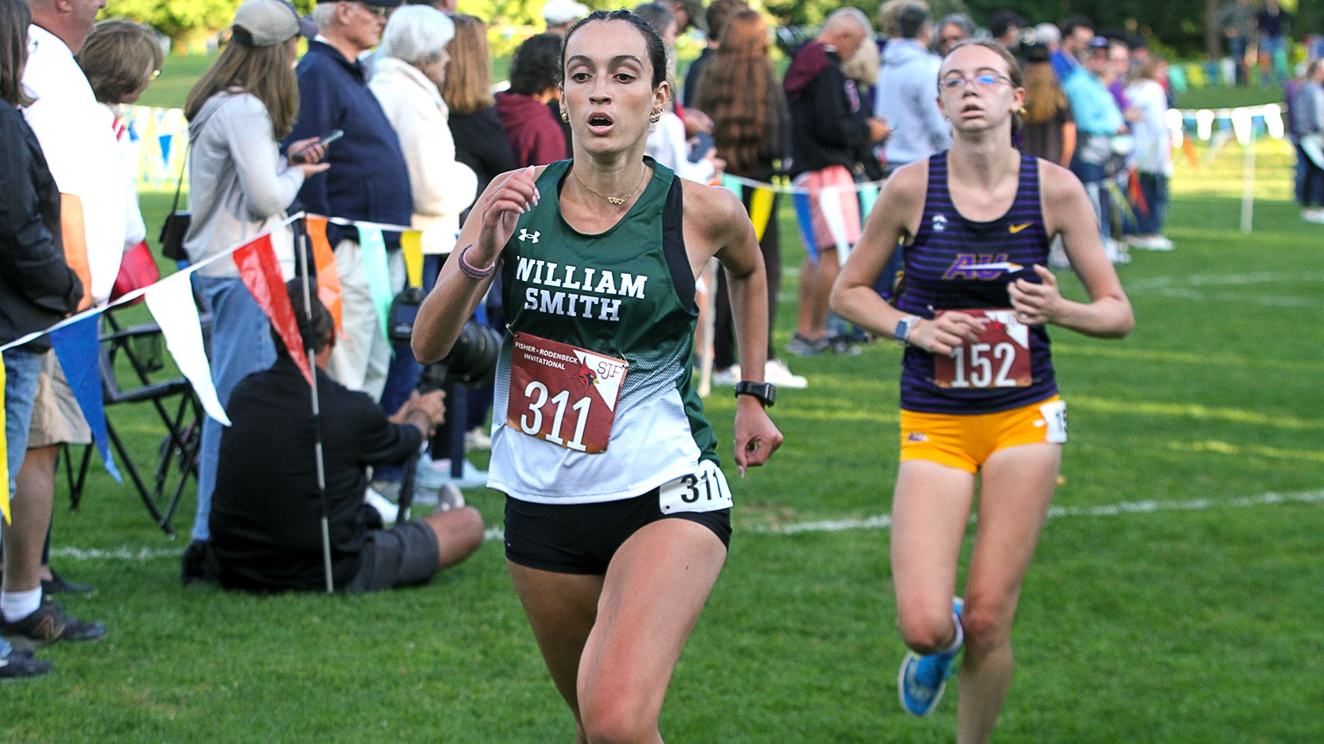 Salma Menkari sprints to the finish line of the 2025 St. John Fisher Rodenbeck Invitational.
