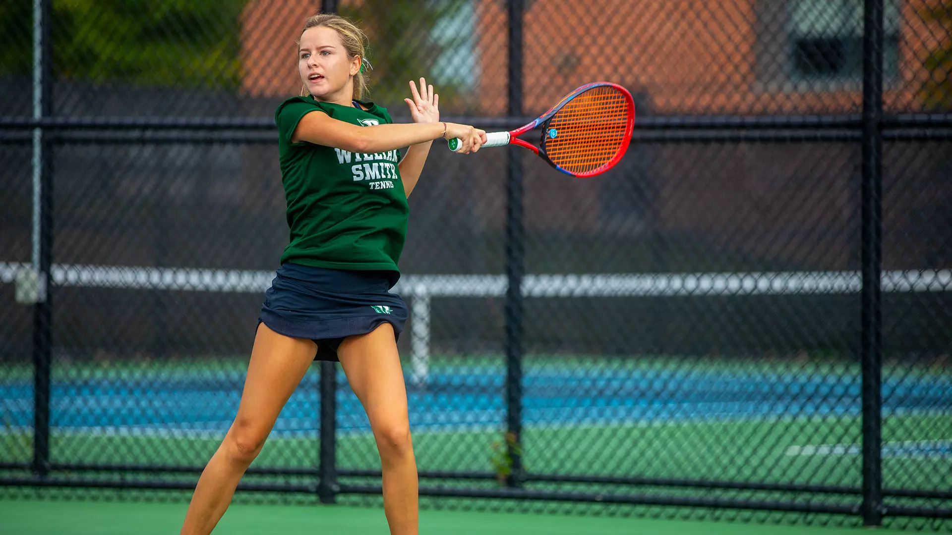 Grace Magna returning the ball