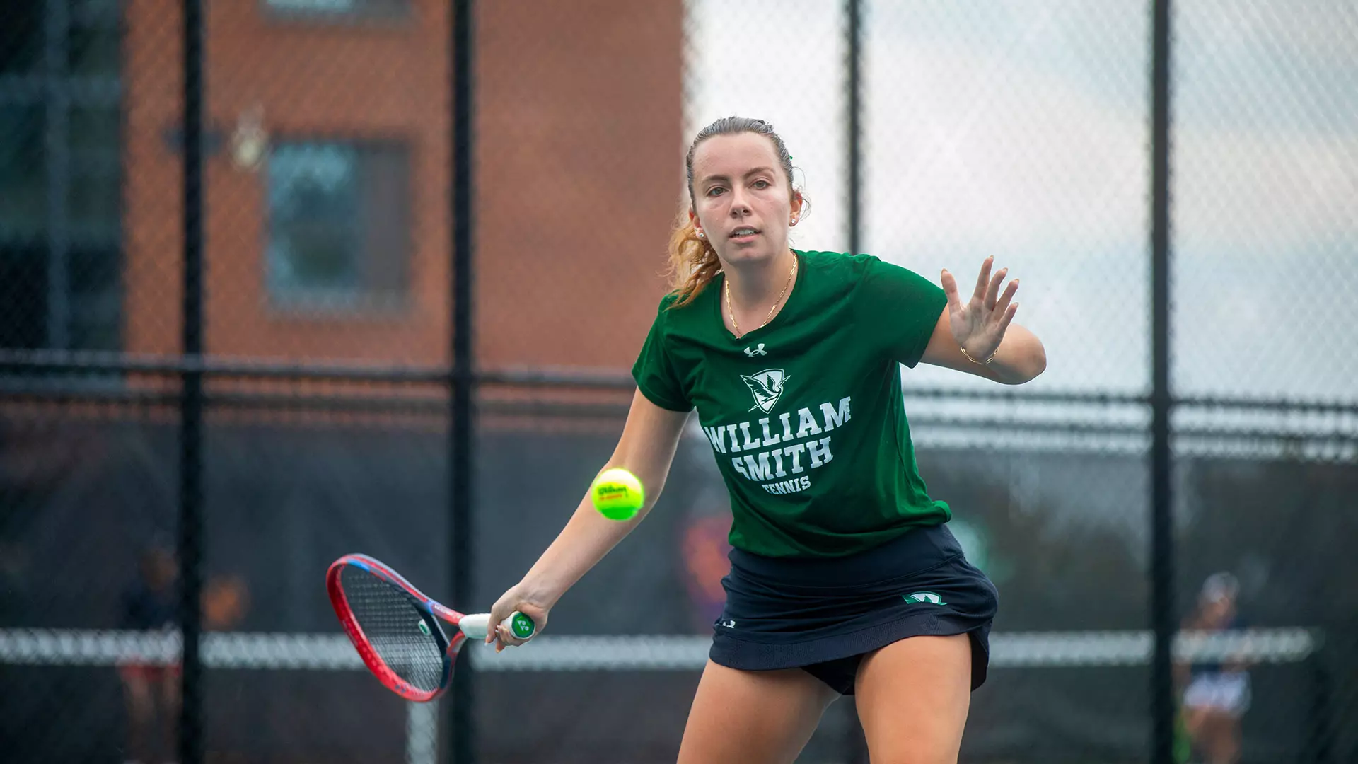Bethany Walker returning the ball