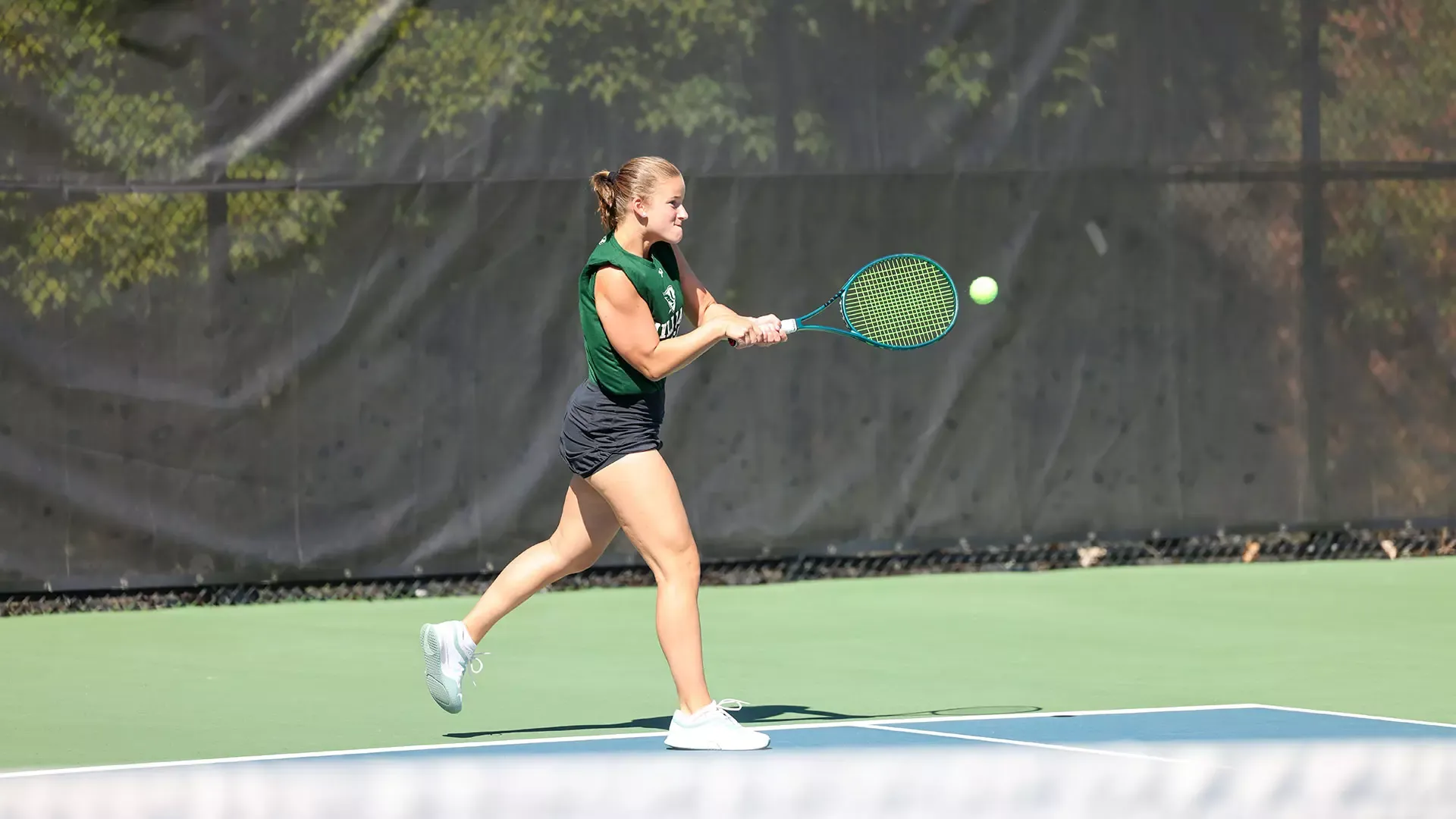 Mia Jacobs Returns the Ball