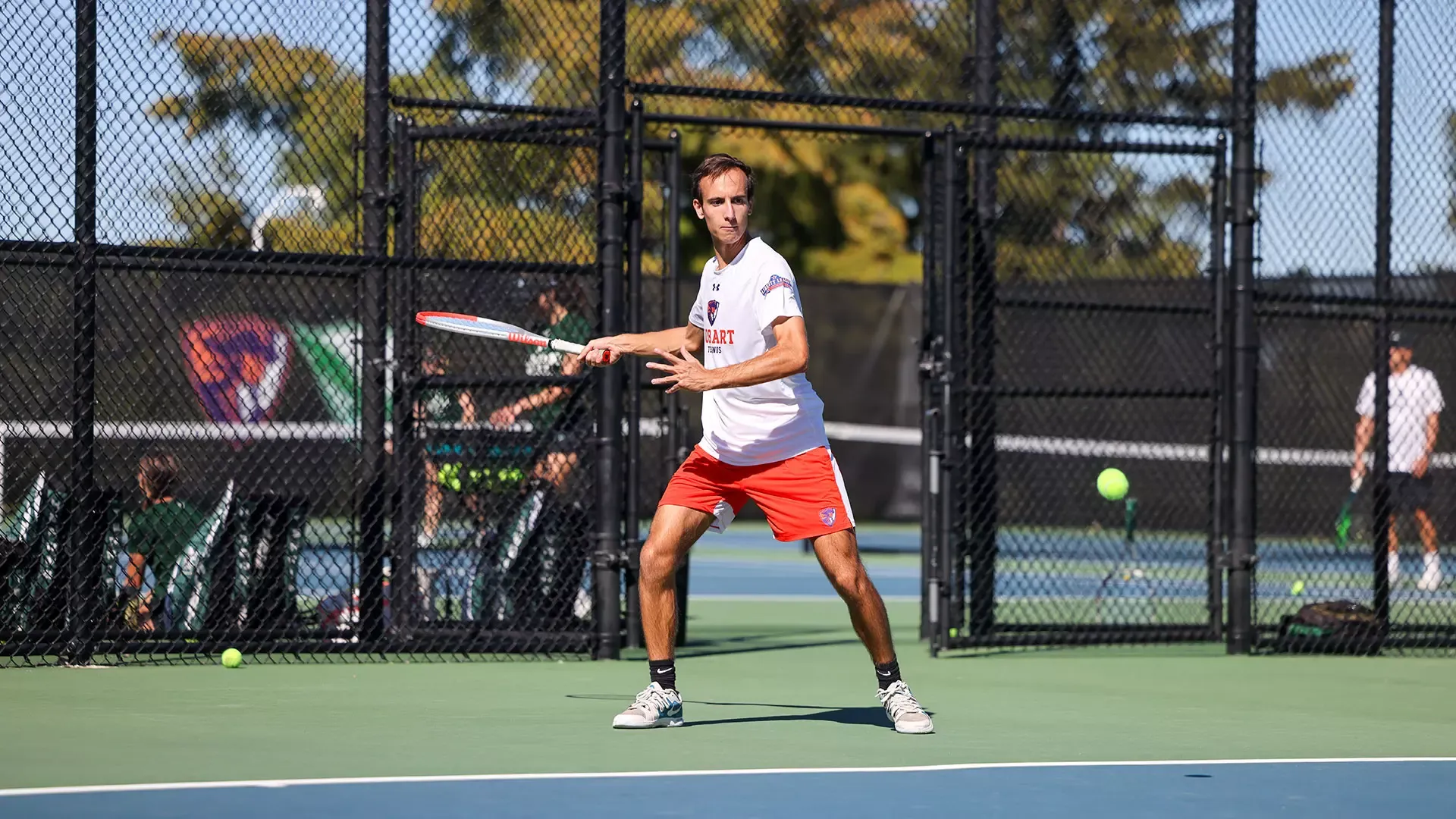 Michael Georgelis loads up for a forehand return 