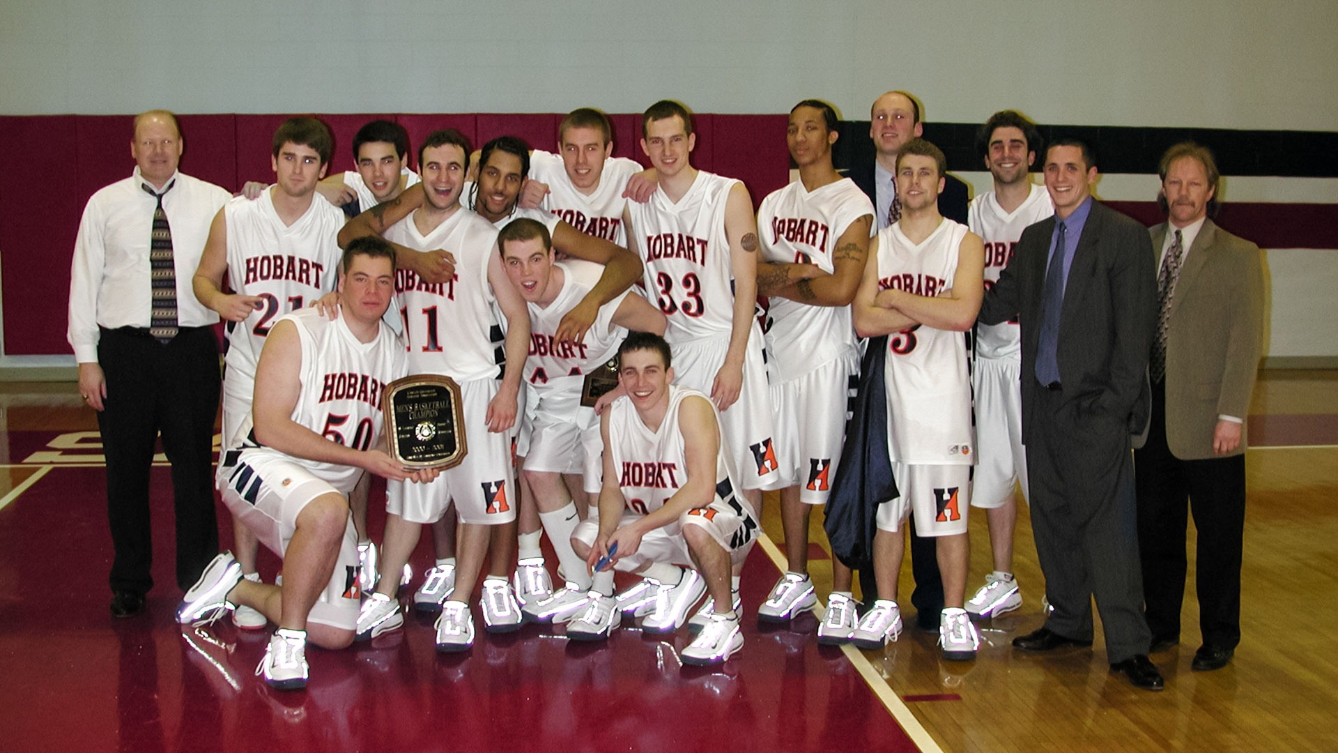 The Hobart basketball team with the 2001 Liberty League Champions trophy