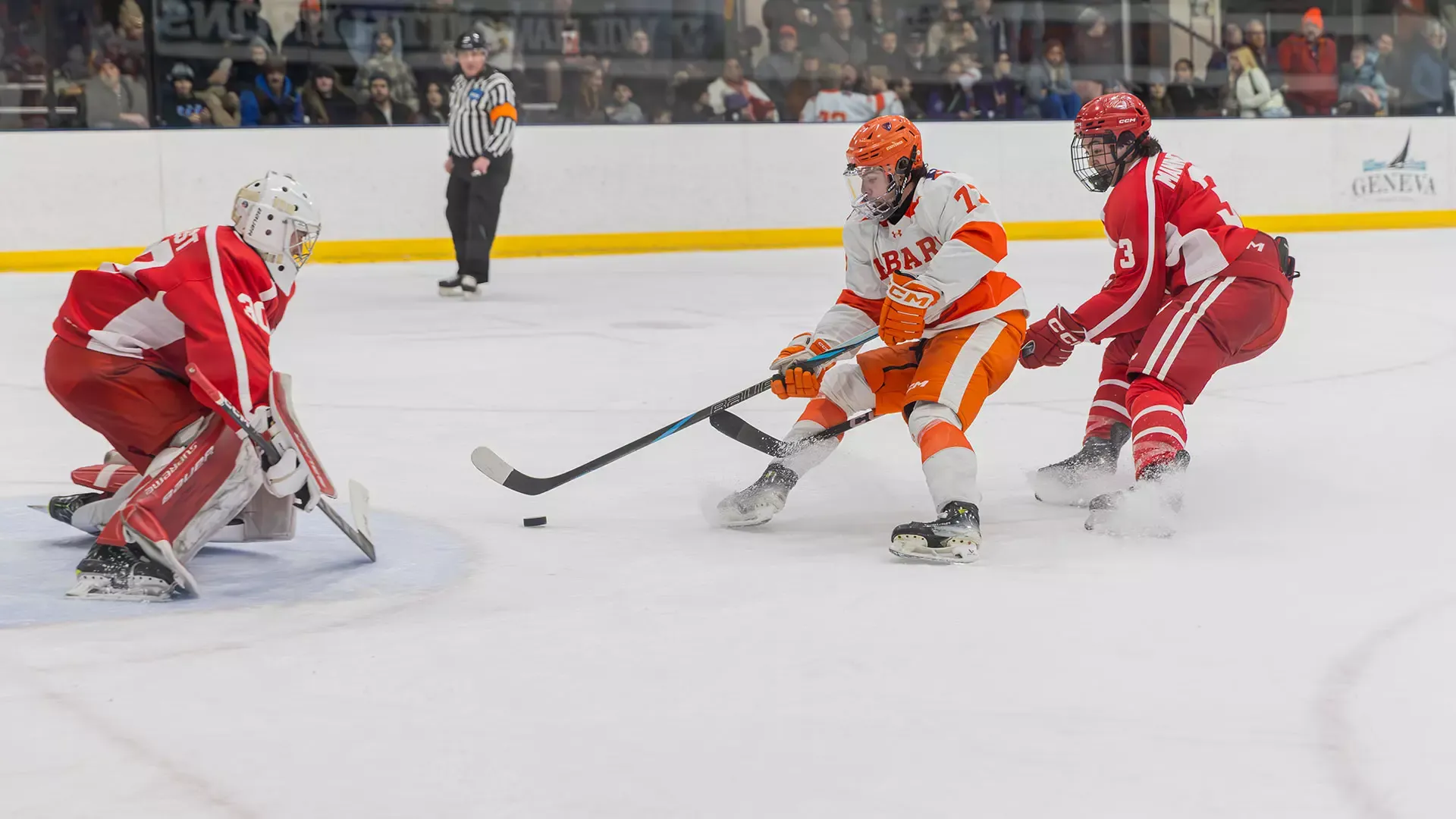 Adam Ondris crashes the net with the puck