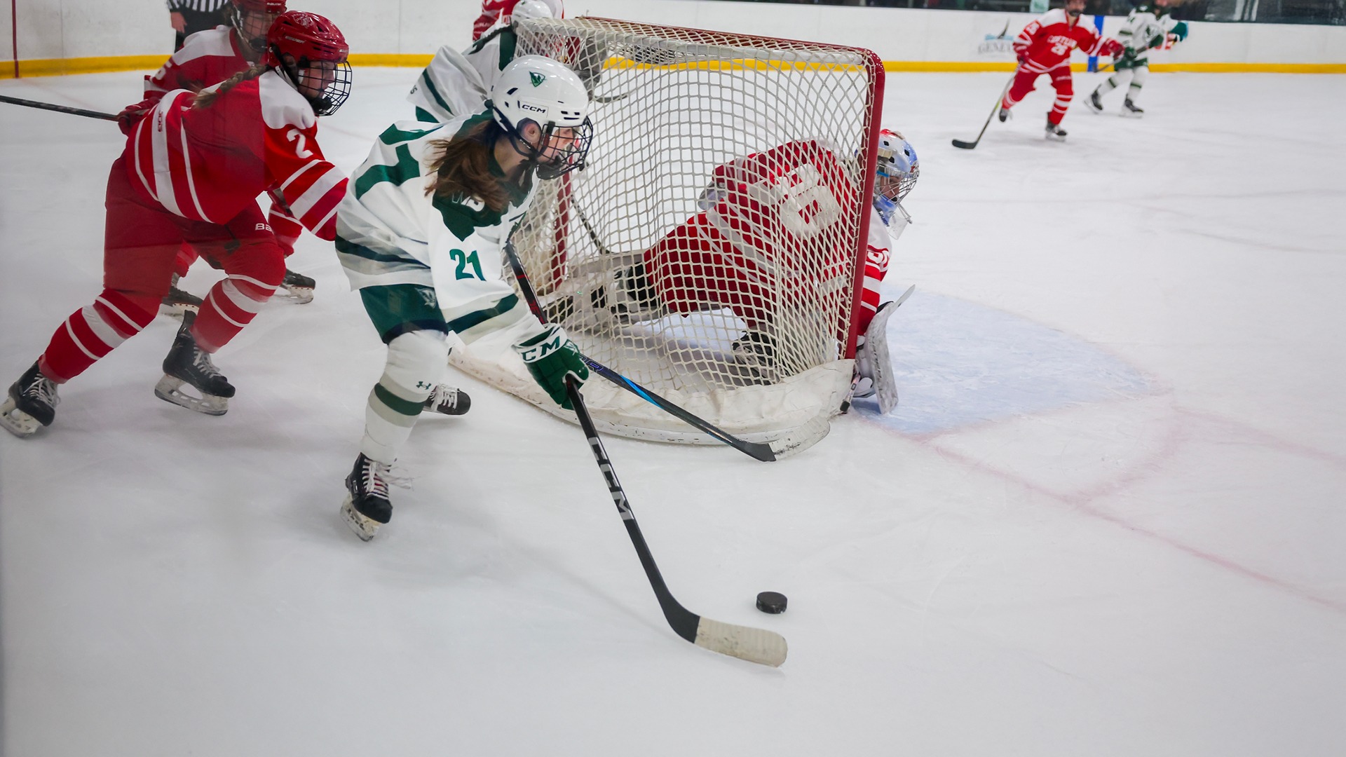 Kelly Howe skates around the back of the net