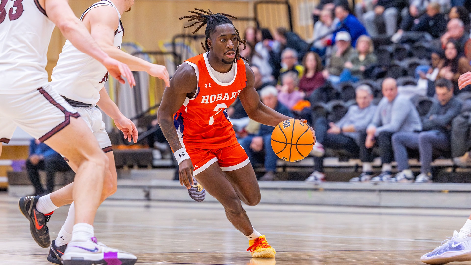 Monty Nedd dribbles down the lane after splitting the defense.