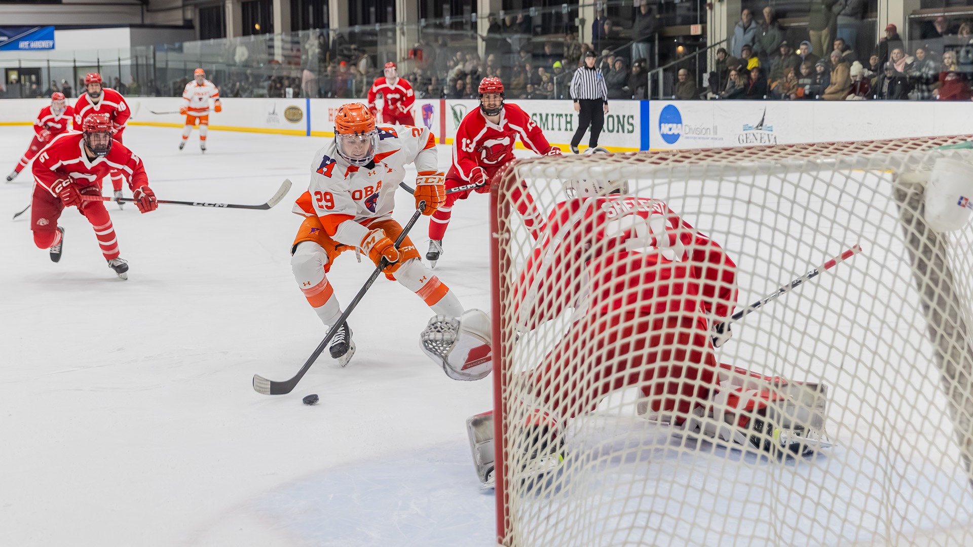 Kahlil Fontana prepares to shoot a puck past the Cortland Goalie