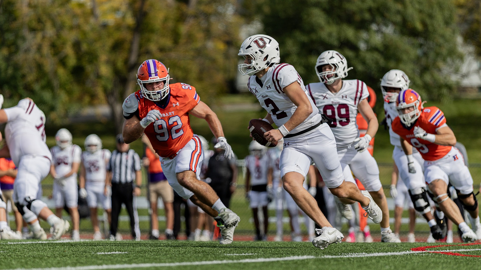 Hunter Vos chases the Union quarterback out of the pocket.