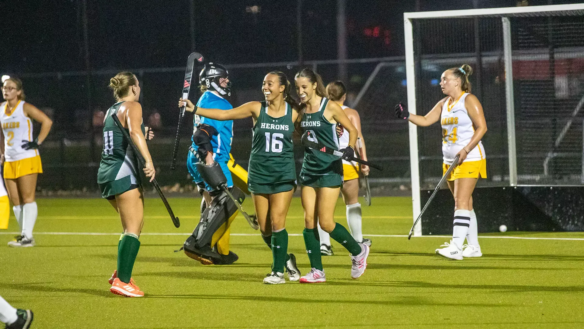 Ashley Edmonds, Ana Dios Vidal and Kylee Knuschke celebrate after a goal 