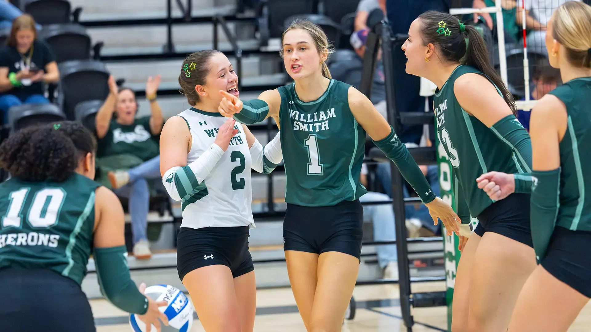 William Smith Volleyball celebrating