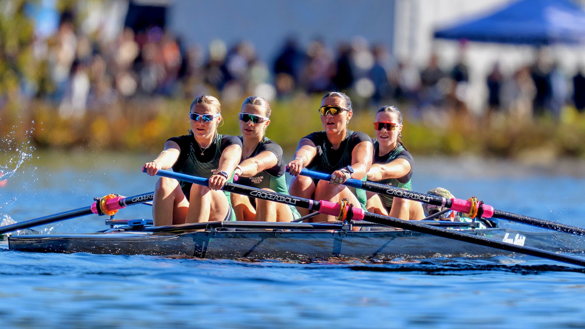 The Herons' collegiate four races down the Charles River to a gold medal at the Head of the Charles regatta