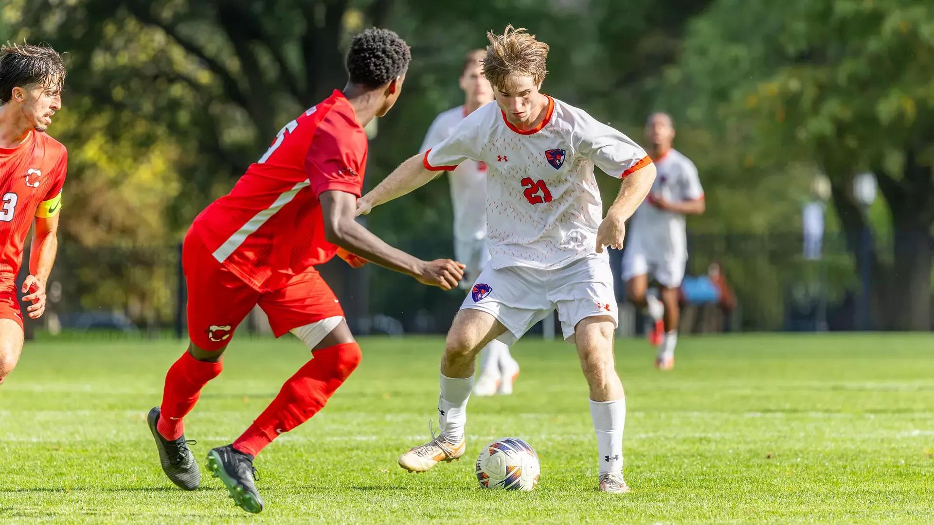 Gabe Smith uses his body to protect the ball