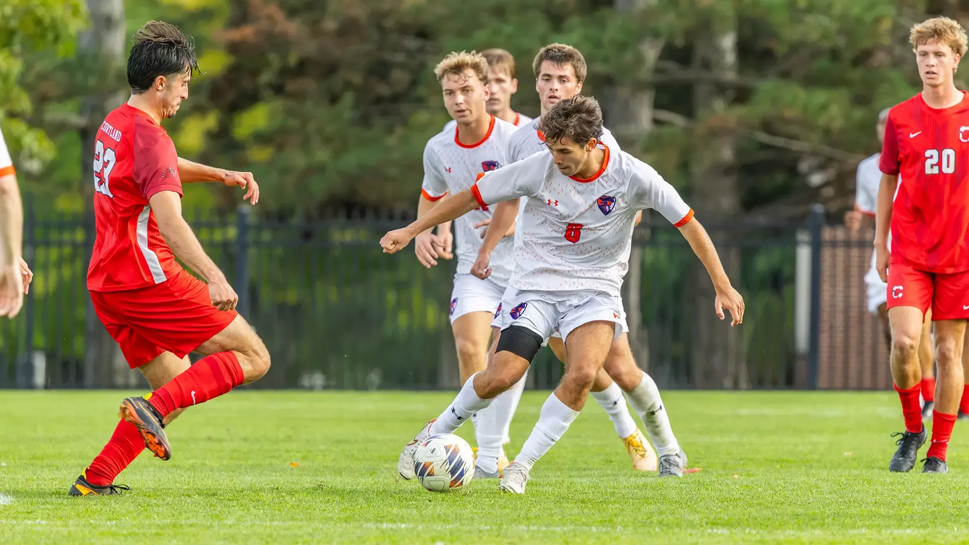 Daniel Scali boxes out his opponent to maintain possession