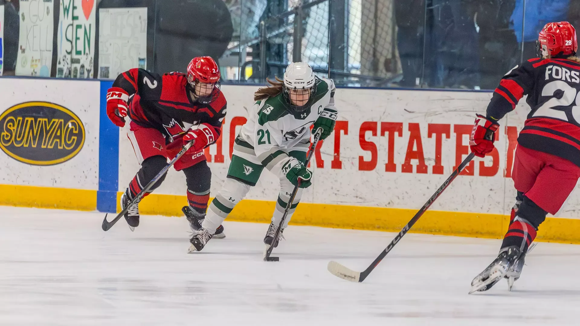 Kelly Howe skates with the puck