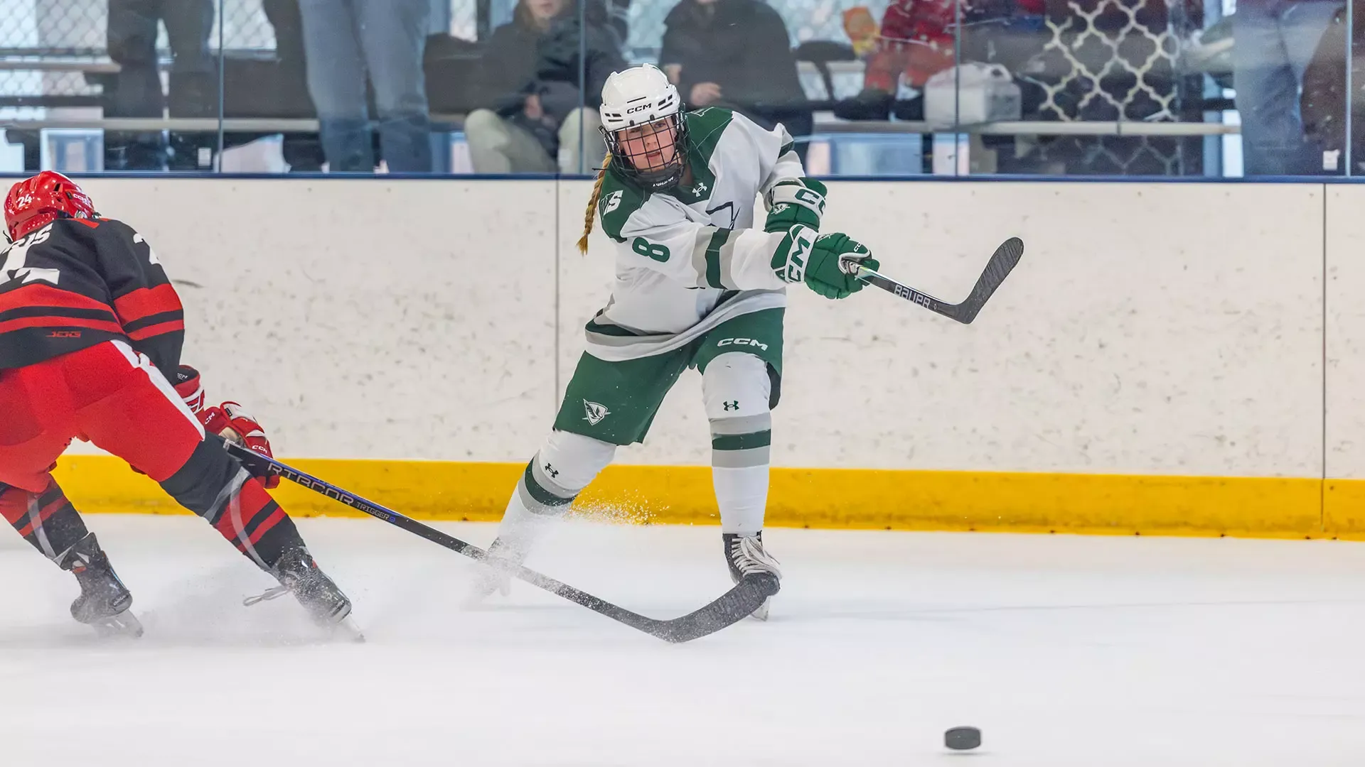 Rowan Kennedy passes the puck