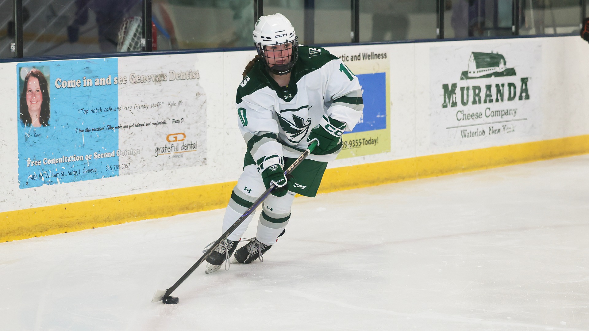 Lily Relyea skates with the puck in the offensive zone