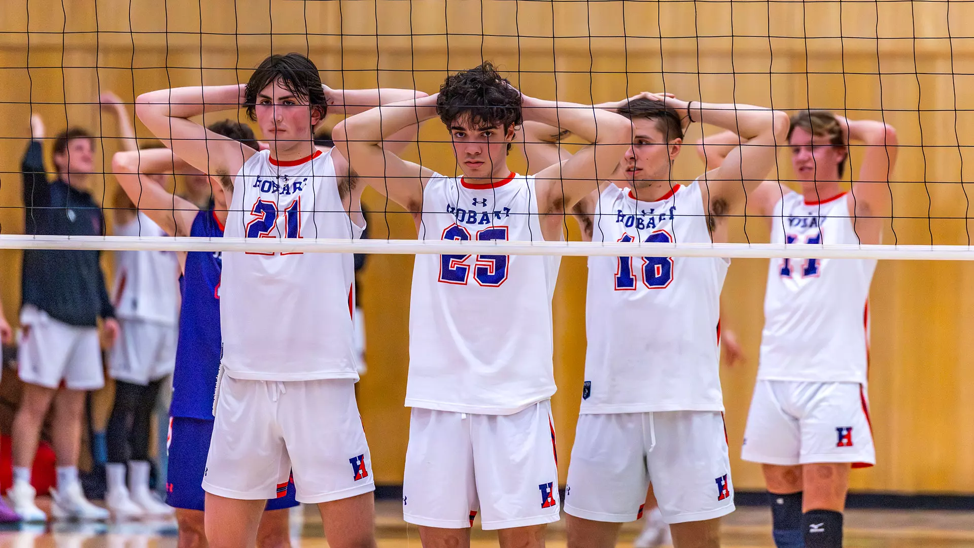 Ben Welsh, Harry Fromberg and Aiden Kemora ready at the net 