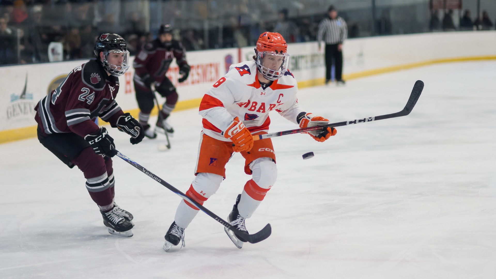 Tanner Daniels skates past a defender against Potsdam