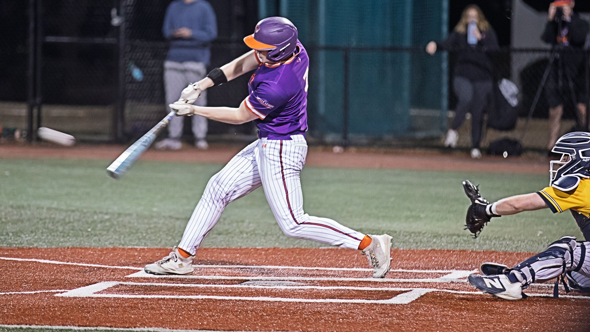 Aidan Davenport rips a triple against TCNJ.