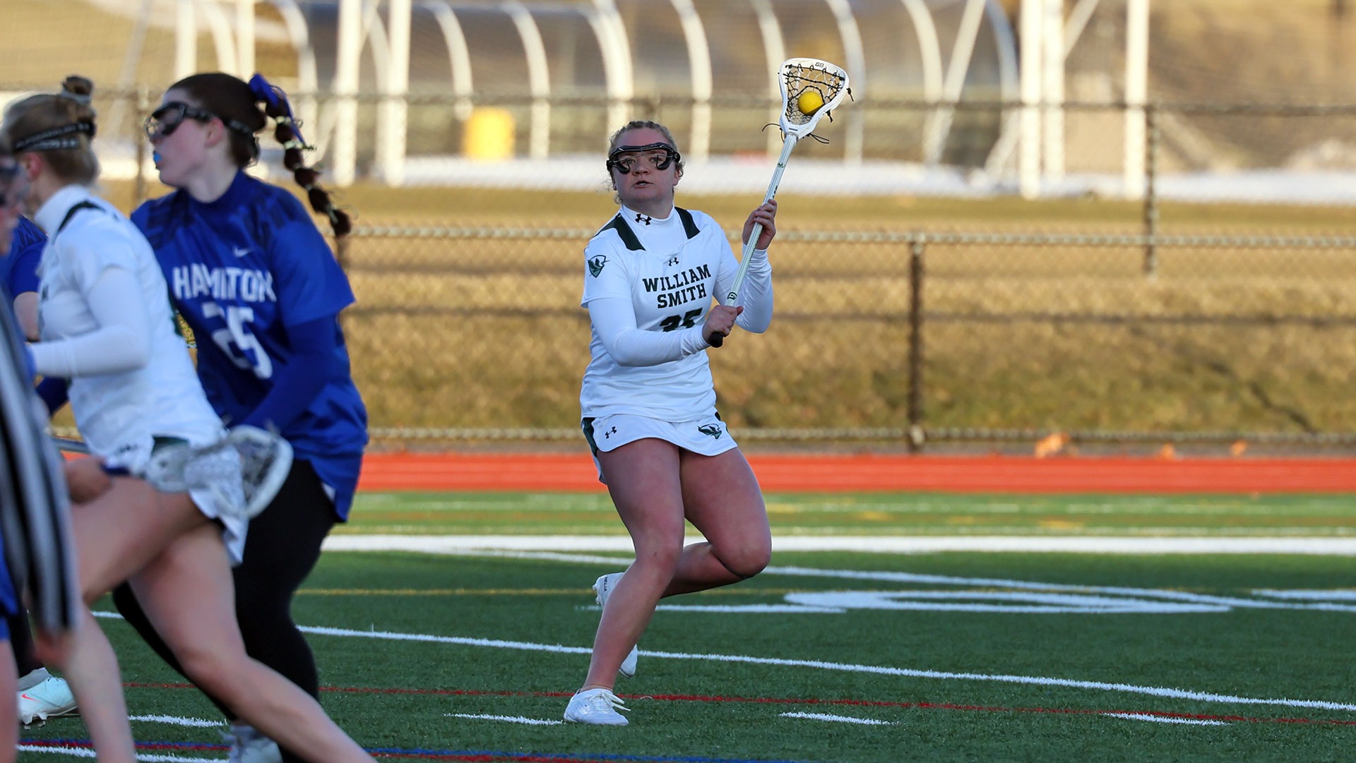 Cat Colvin looks to pass the ball to a teammate