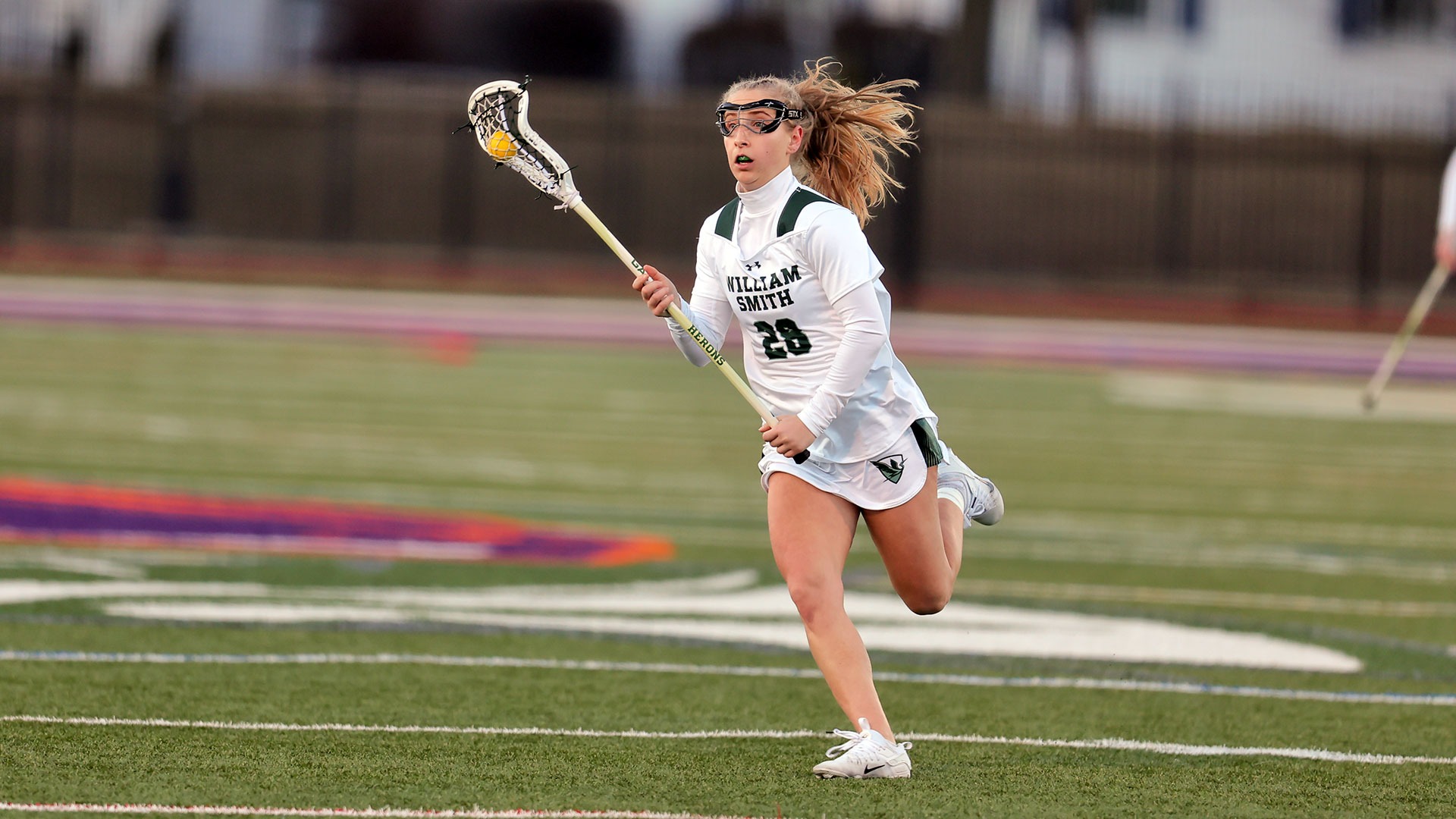 Katie Grottenthaler runs into the offensive end of the field