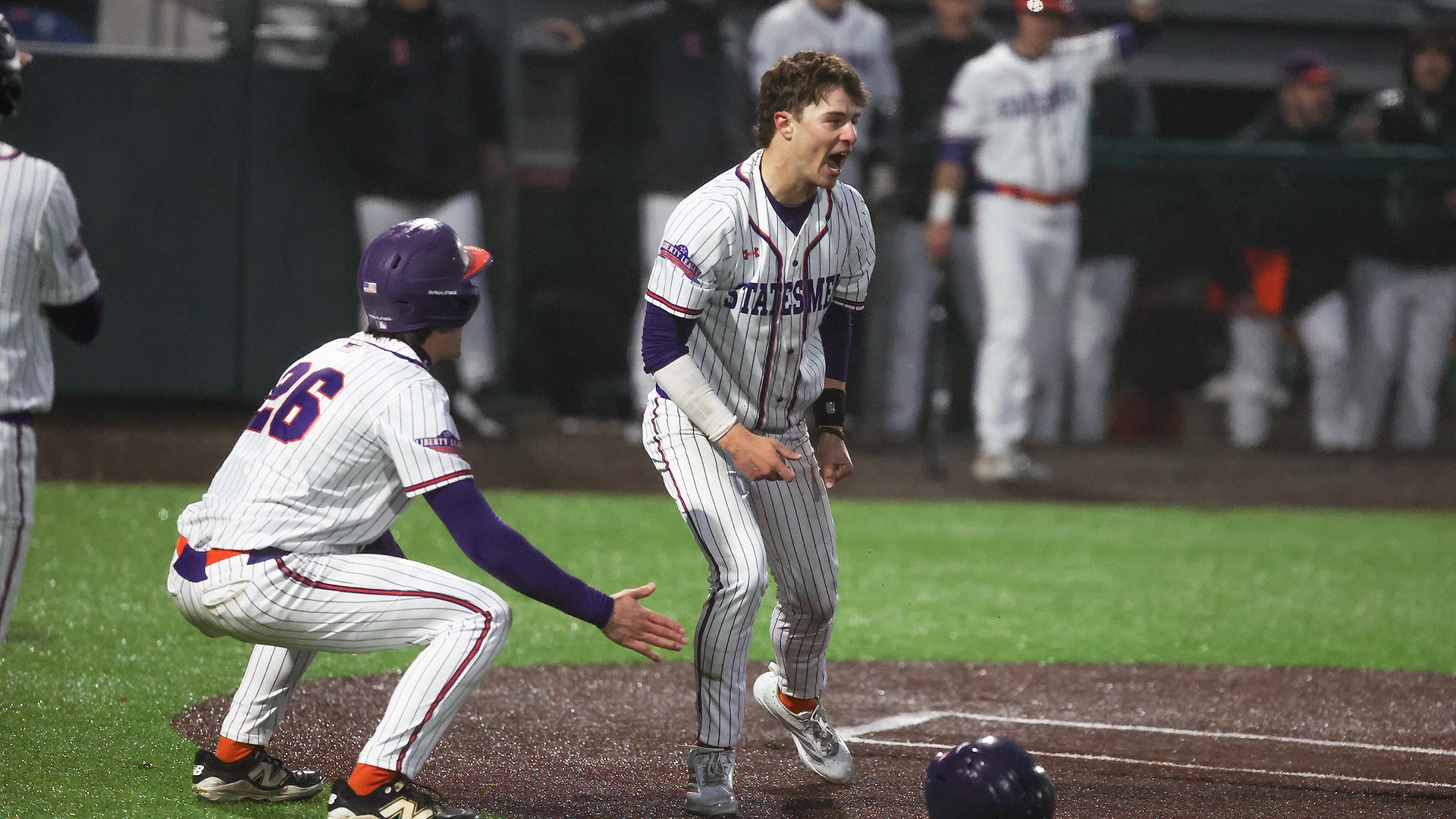 Two Statesmen celebrate after scoring on a double by Christian Petry.