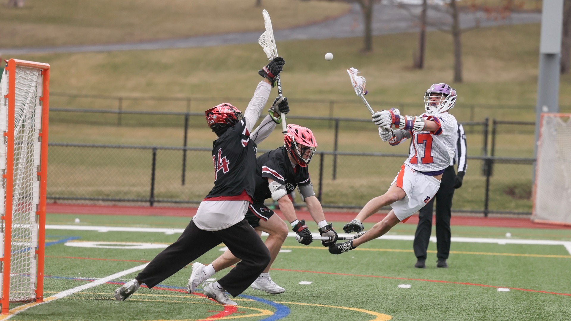 Johnny Harding flies through the air after sending a shot at the Saint Joseph's goal.