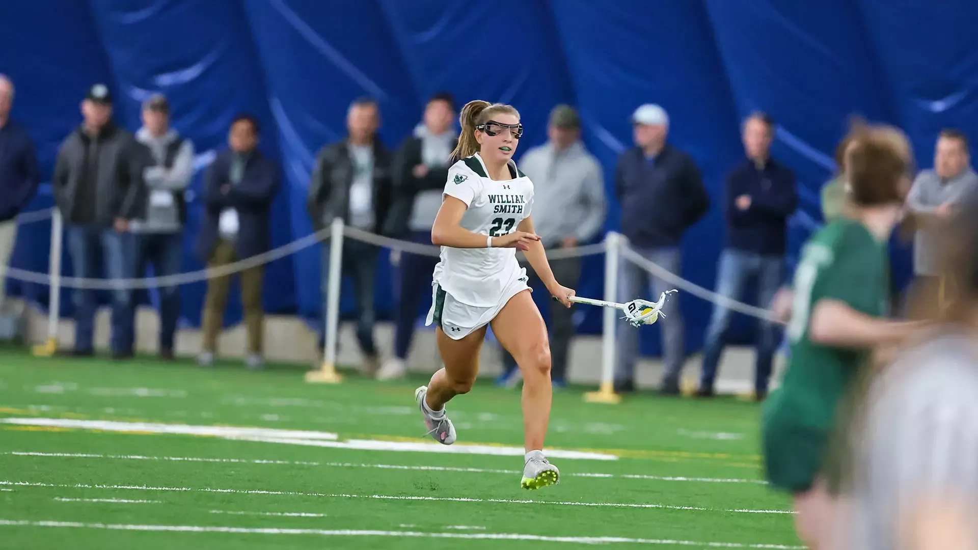 Janey Sypeck sprinting downfield 