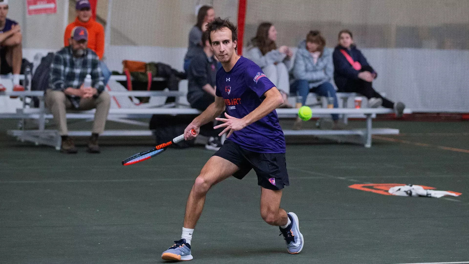 Michael Georgelis prepares to hit the ball