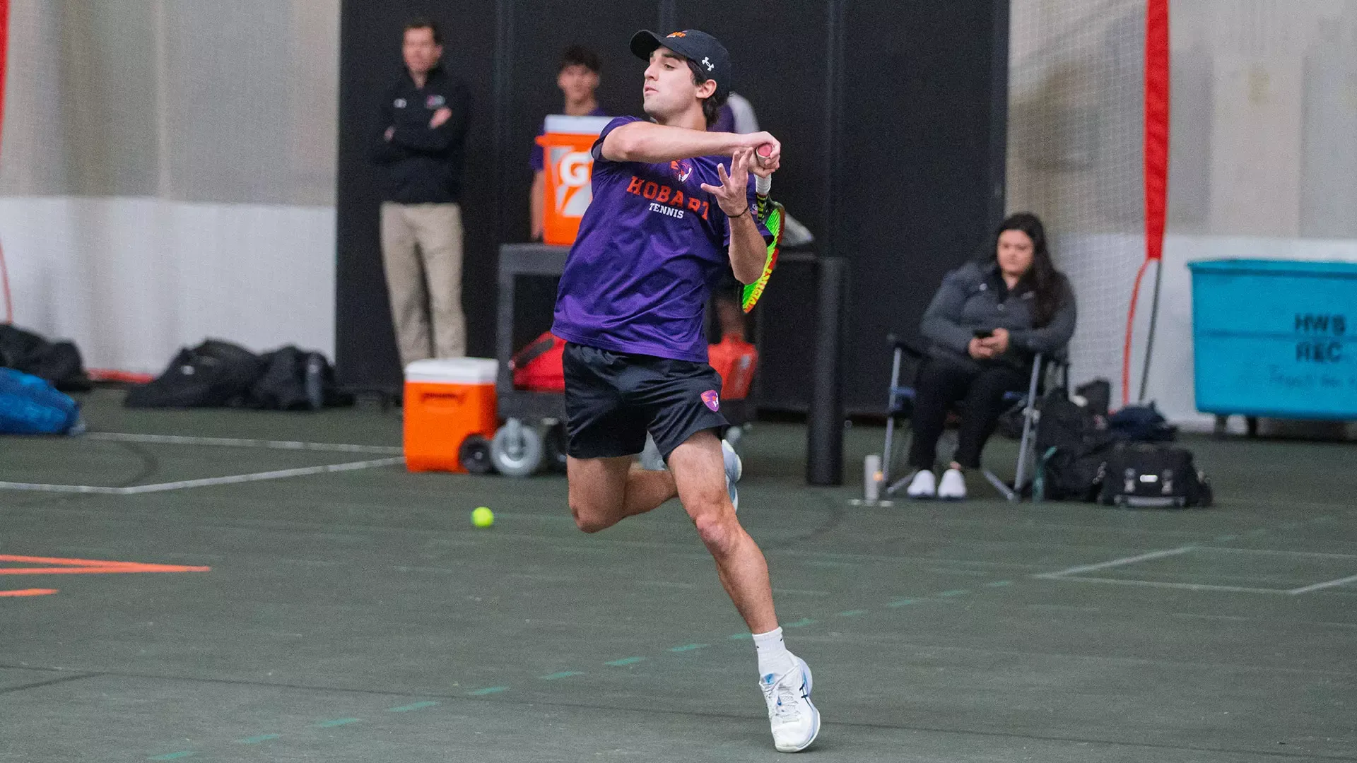 Achilleas Kousaridis follow through after a hit