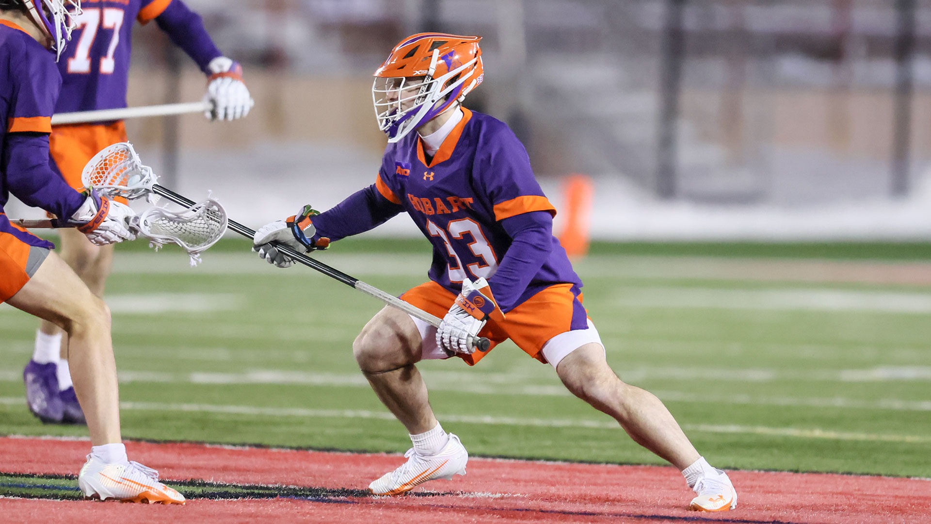 Defenseman Brady Comella collects a ground ball near midfield.