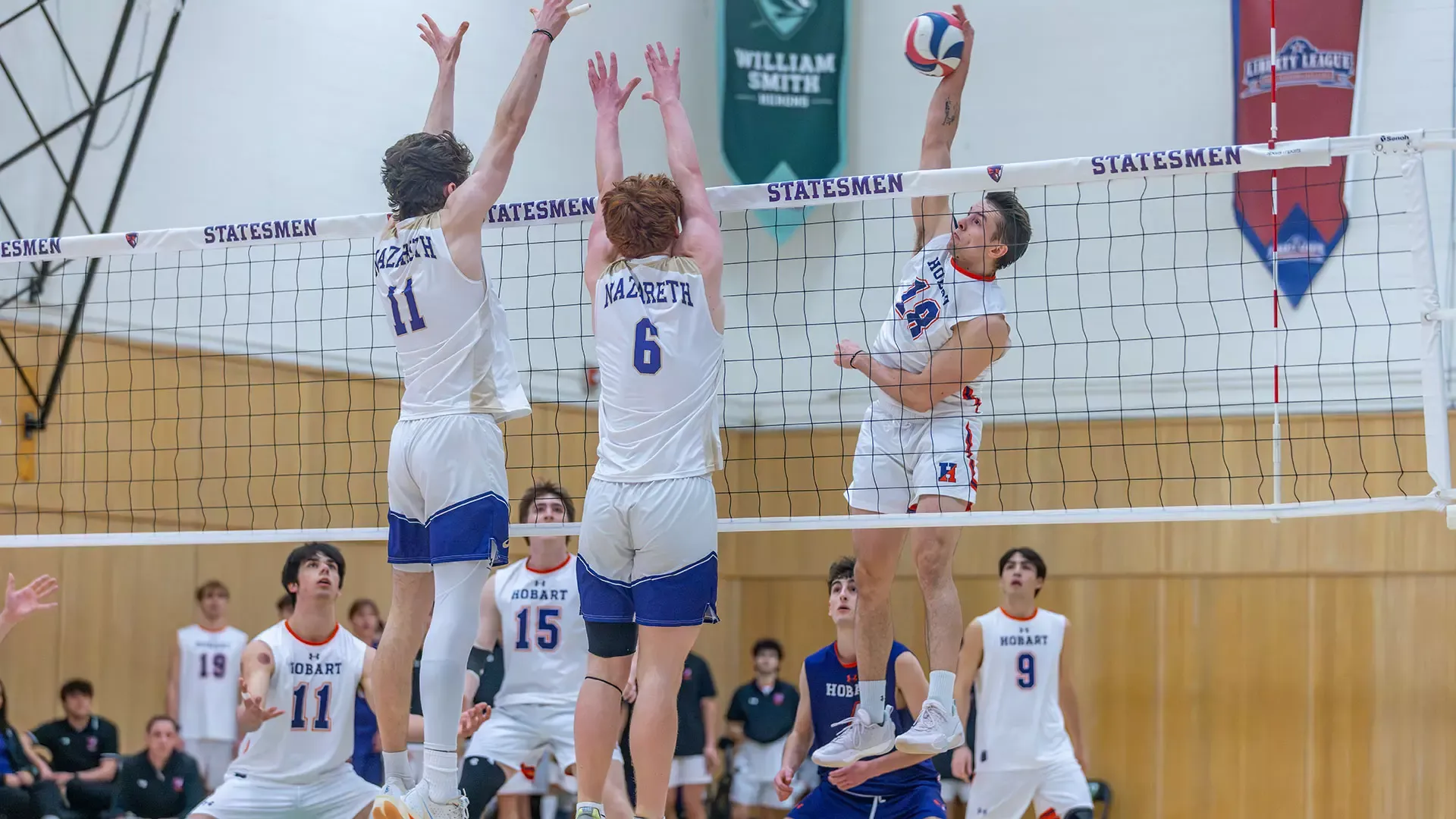 Aiden Kemora swings around the Nazareth block