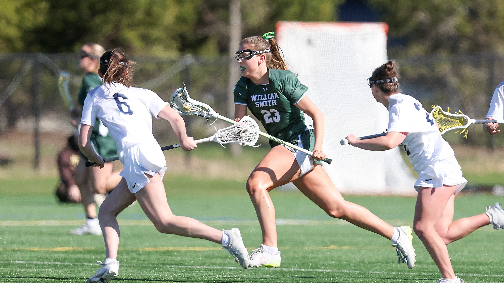 Janey Sypeck clears the ball against Ithaca