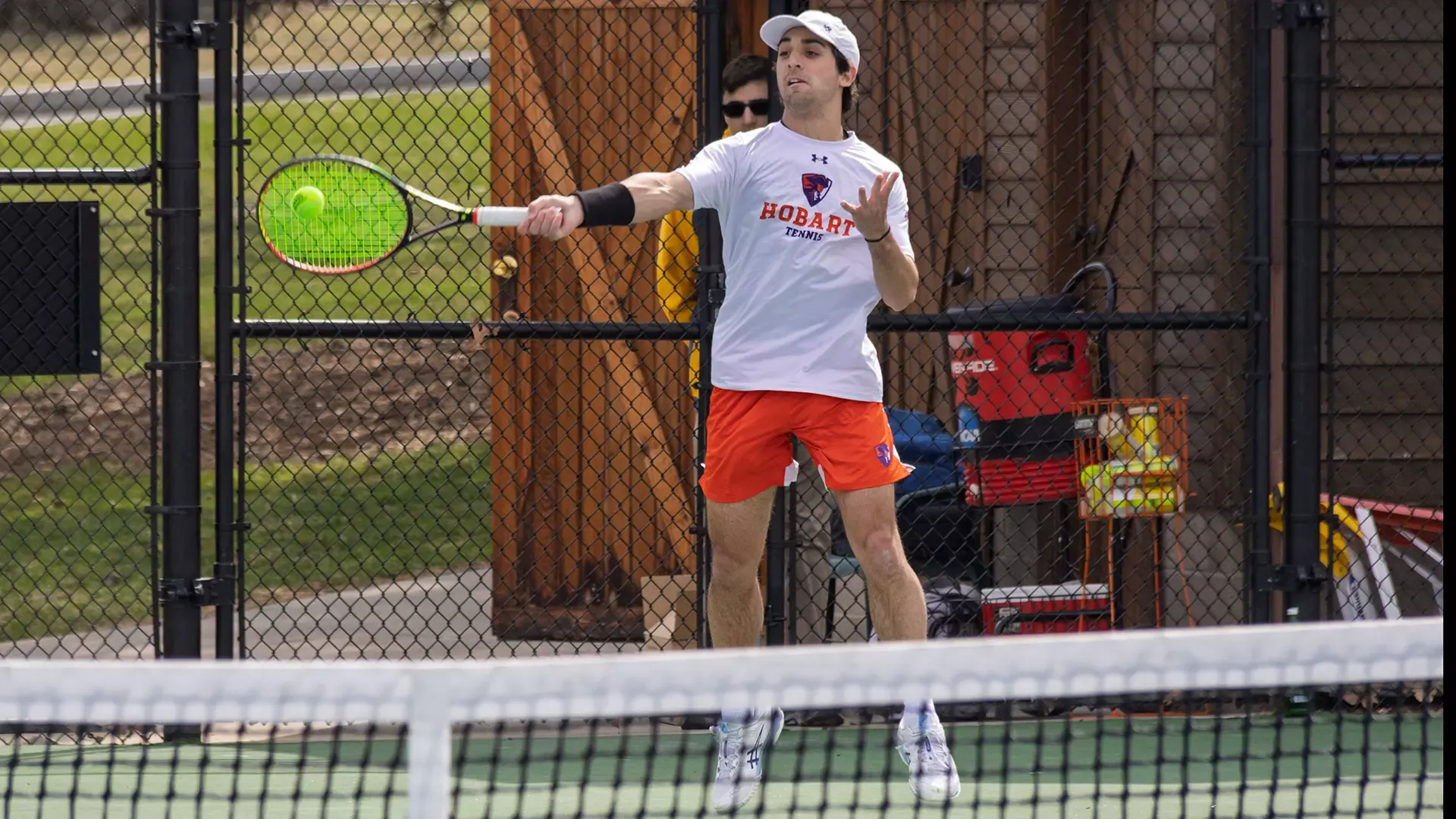 Achilleas Kousaridis hits a forehand 