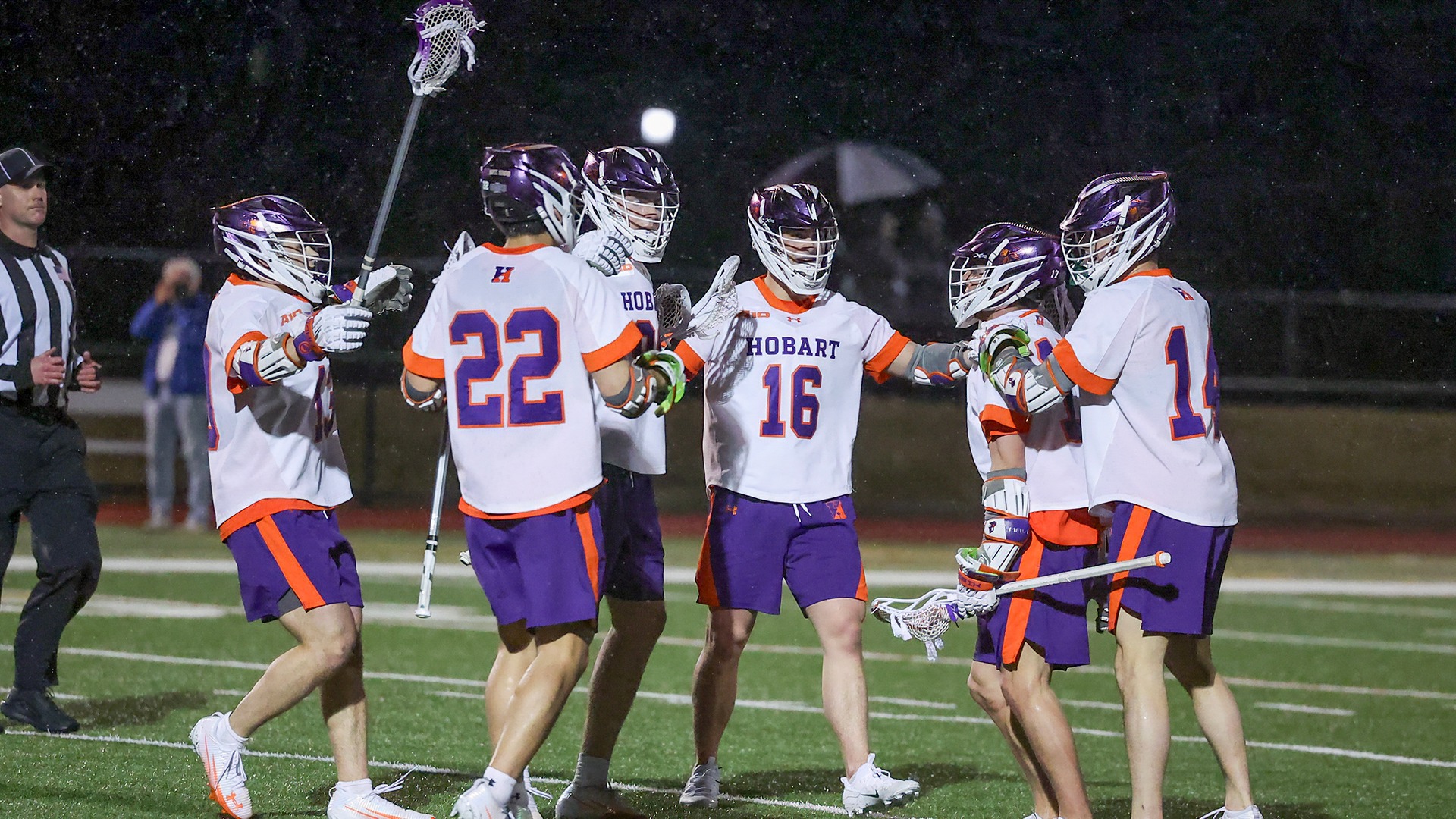 The Hobart attack and midfield celebrate a goal against Le Moyne.