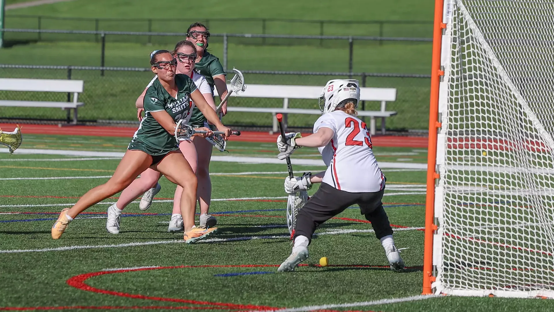 Mia Falco bounces a shot between the goalie's legs