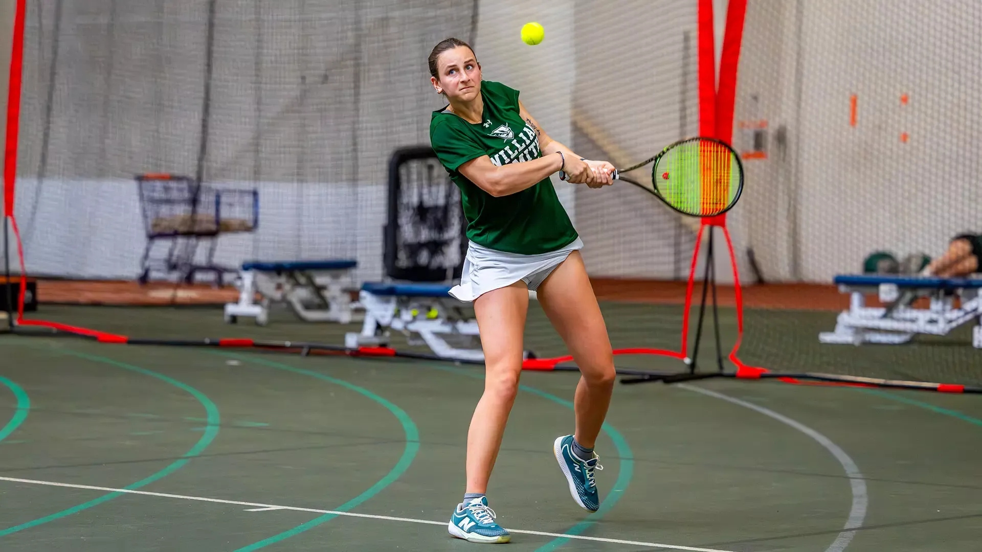 Haley Levine hits a backhand 