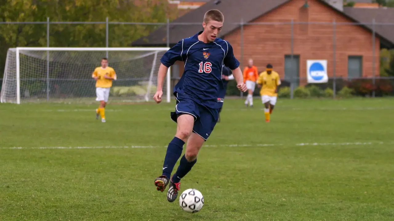 Rick Klotz dribbles a soccer ball.