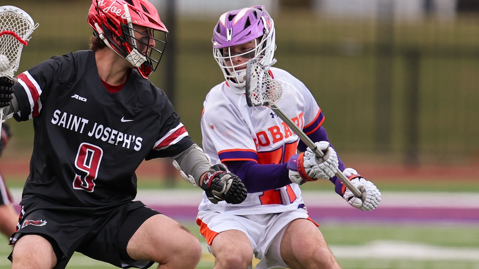 Colman Craft guards a Saint Joseph's player.