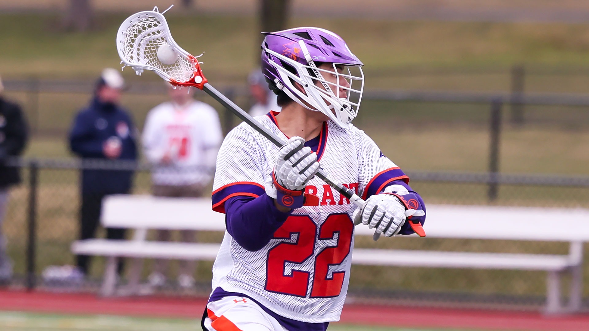 David Peterkin cradles the ball against Saint Joseph's.