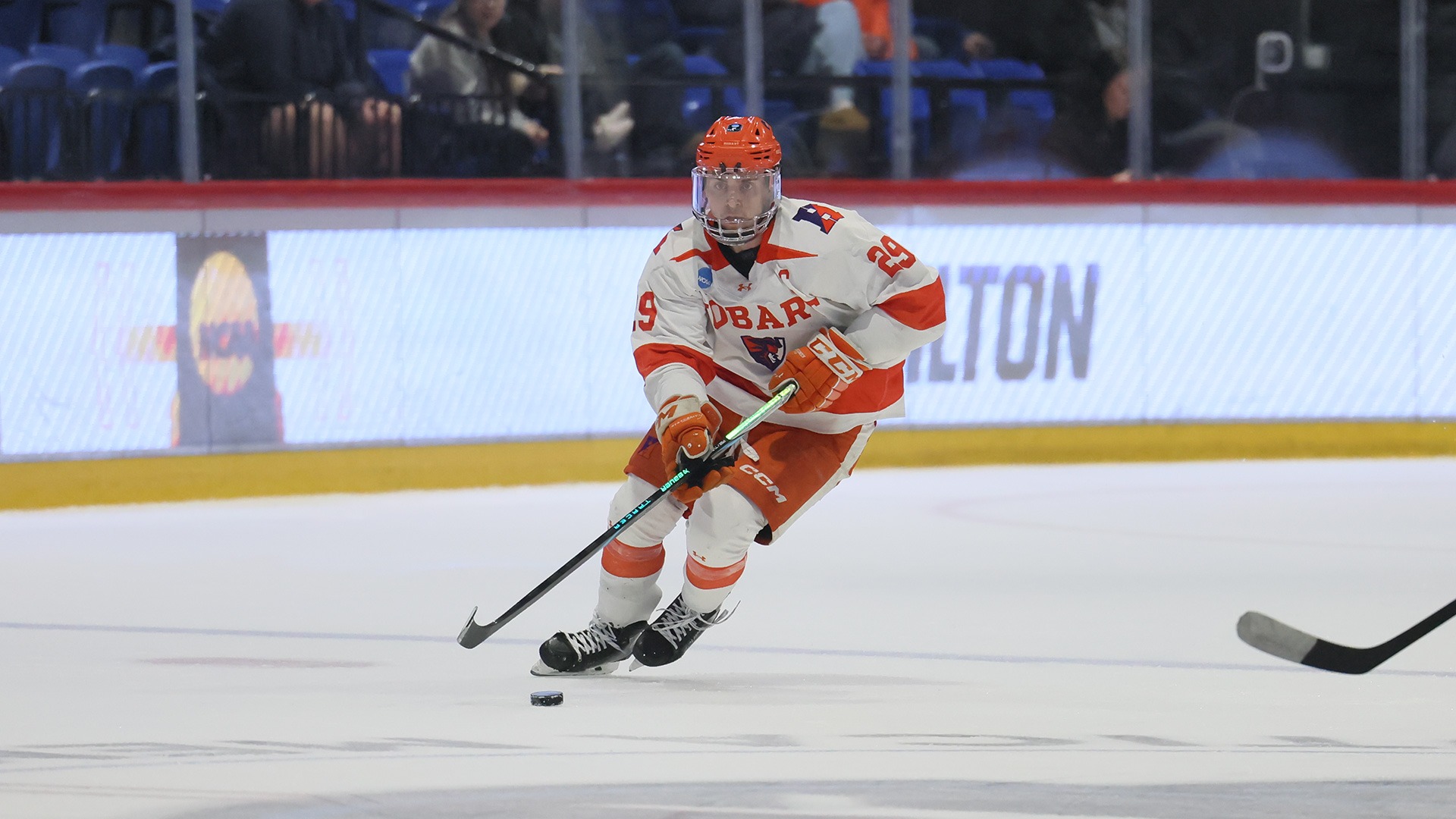 Kahlil Fontana skates through the neutral zone with the puck against UW-Stout