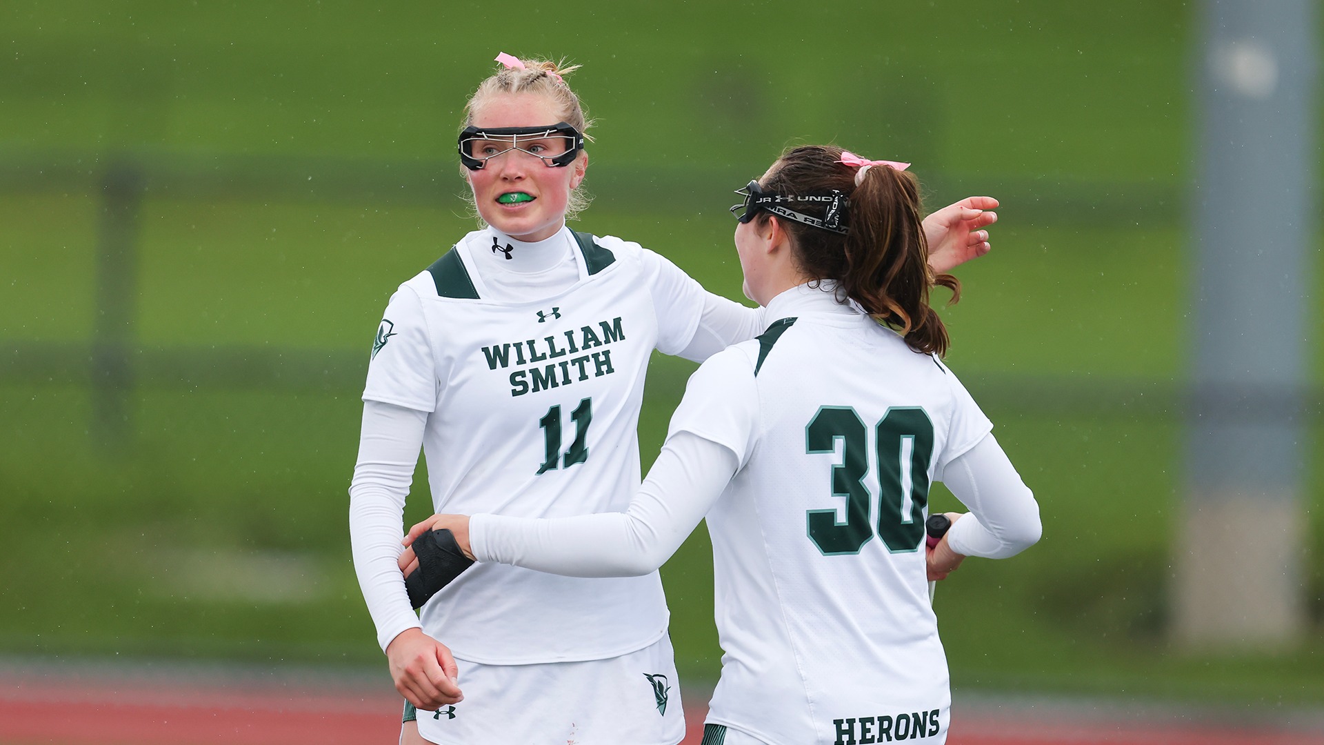 Kira Fulton and Mia Celebrate a goal against Rochester
