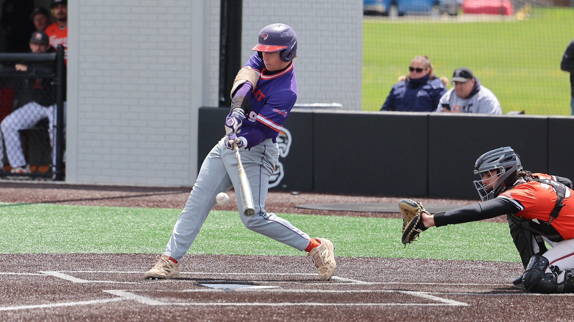 Sean Garvin puts the ball in play against RIT.