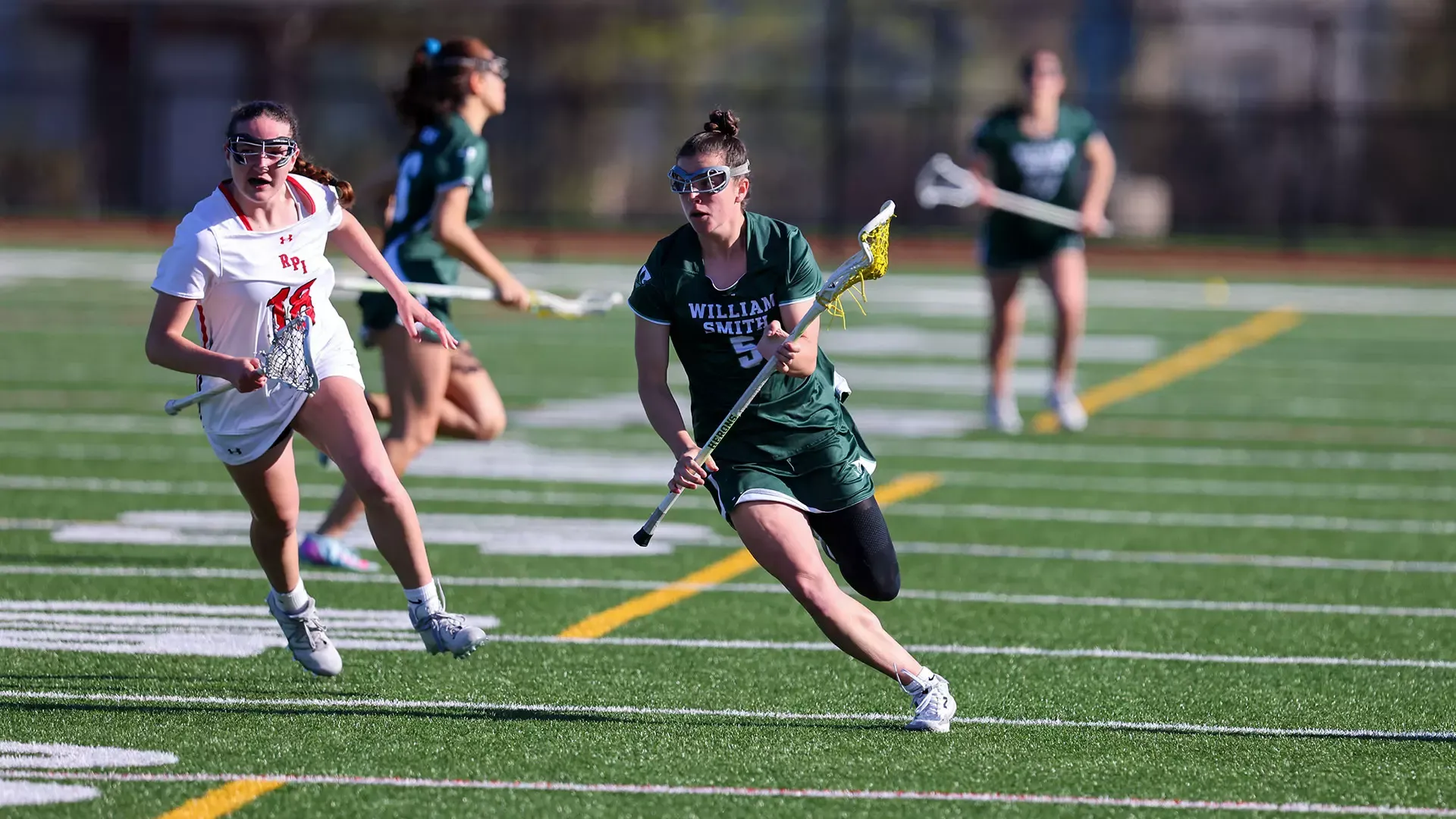 Delaney Cassidy runs up the field