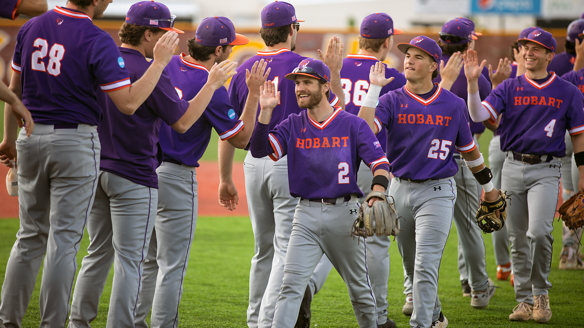 Christian Petry and the Statesmen celebrate an NCAA tournament win over Mount Union.