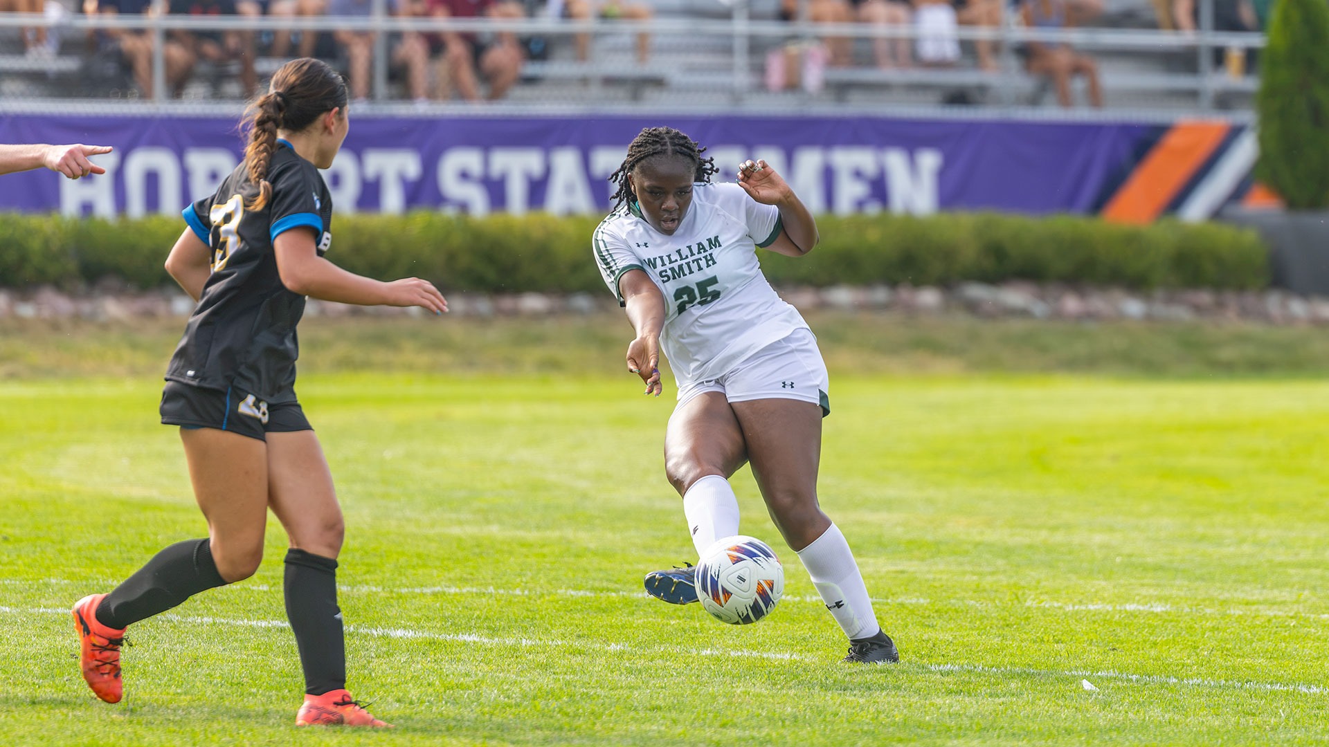 Ameya Moncrieffe takes a shot on goal against Emmanuel