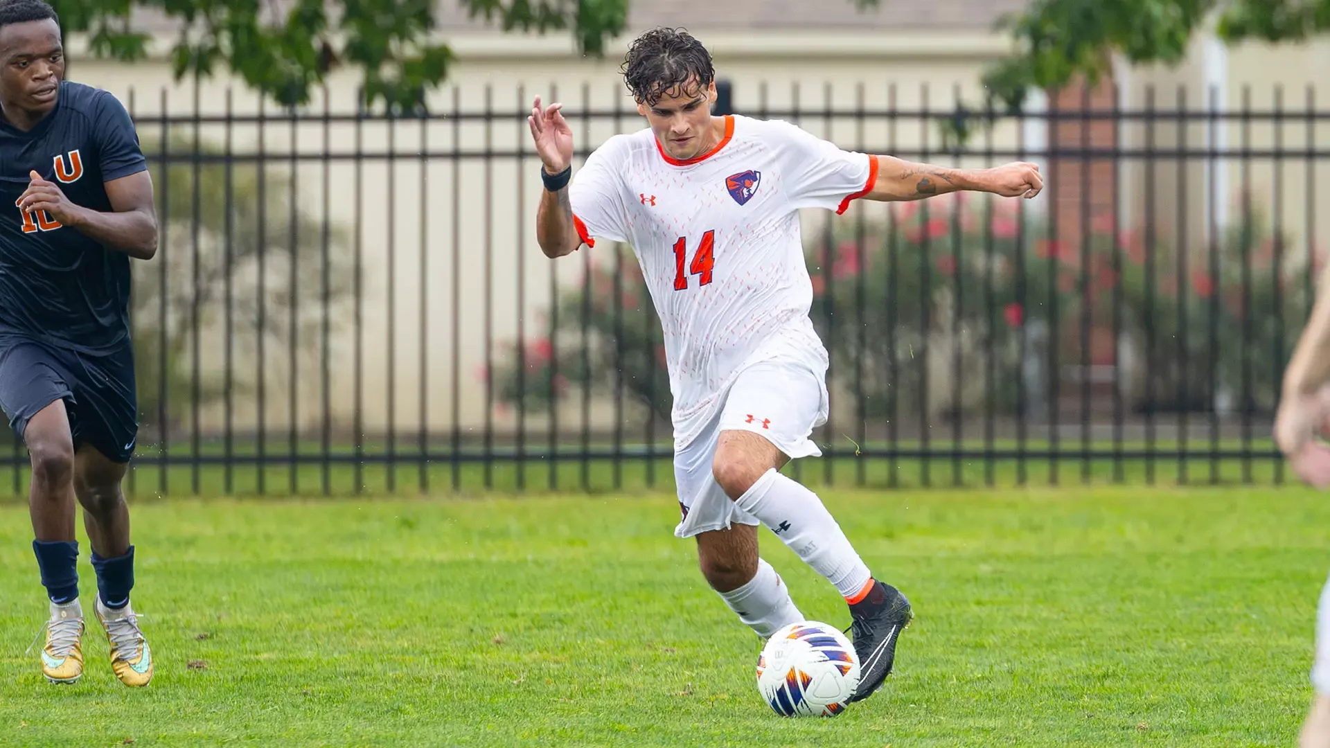 Danny Spataro passes the ball