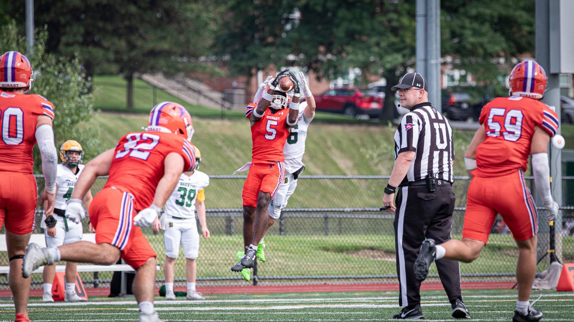 Zeshan Dixon makes one of his three interceptions against Brockport.