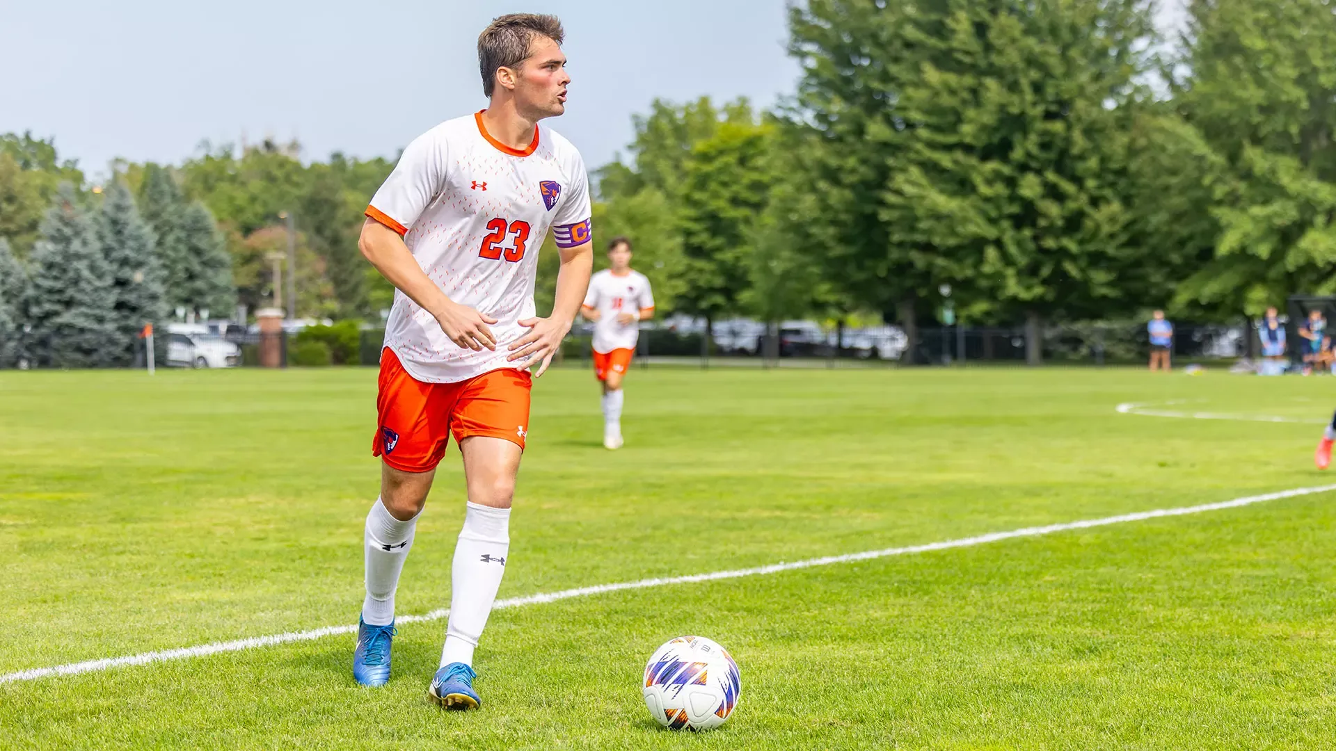 Noah Fischer staying with the ball.